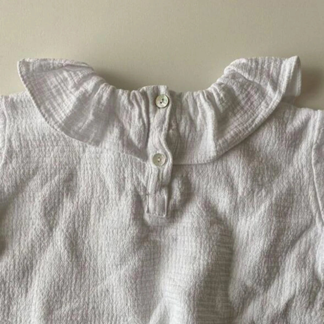 Ruffled Crew Neck Long-Sleeved Blouse