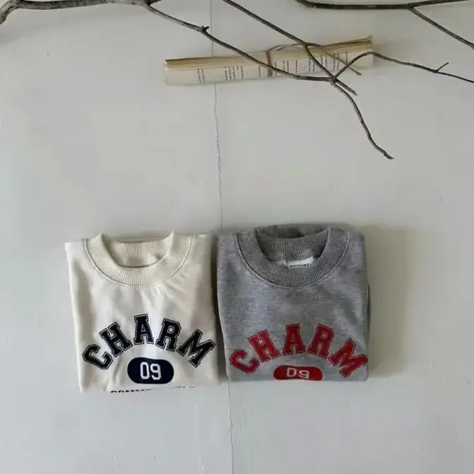 "CHARM" Long-Sleeved Onesie
