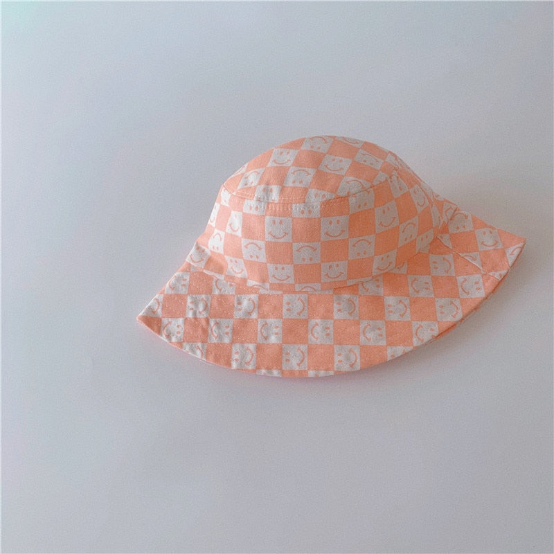 Checkered Smiley Face Bucket Hat